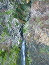 Aerial view of the cliffside and Corrego da Furna waterfall. Madeira, Portugal