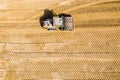 Aerial view, close up details of highway construction site - industrial machinery, vibratory soil compactor working Royalty Free Stock Photo