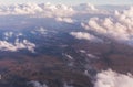 Aerial view of clouds lit by the evening sun over Florida, view from the aircraft during the flight. Royalty Free Stock Photo