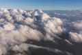 Aerial view of clouds lit by the evening sun over Florida, view from the aircraft during the flight. Royalty Free Stock Photo