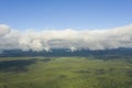 Aerial view clouds over the forest . View from drone. Aerial top view cloudscape. Texture of clouds. View green forest from above Royalty Free Stock Photo