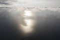 Aerial view clouds over the sea with ship. View from drone. Aerial top view cloudscape. Texture of clouds. View from above. Royalty Free Stock Photo