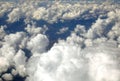 aerial view clouds photographed airplane during transcontinental flight Royalty Free Stock Photo