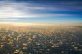 Aerial view of a cloudy sunset while flying above the clouds., Maui, Hawaii Royalty Free Stock Photo