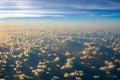 Aerial view of a cloudy sunset while flying above the clouds., Maui, Hawaii Royalty Free Stock Photo