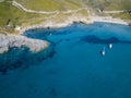 Aerial view of the coast of Corsica, winding roads and coves with crystalline sea. Gulf of Aliso. France Royalty Free Stock Photo