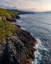 Aerial view of the coast with large cliffs at sunset. Cantabria, Royalty Free Stock Photo
