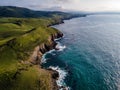 Aerial view of the coast with large cliffs at sunset. Cantabria, Royalty Free Stock Photo