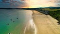 Aerial view of the coast of the Quarry beach during sunset in Wales Abersoch, United Kingdom