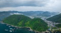 Aerial view of coastal mountain and small town at dawn