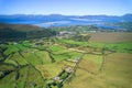 Aerial view of a coastal town with blue sky in Glenbeigh, Kerry County Ireland