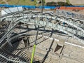Aerial view of a coliseum with a collapsed metal structure and undergoing structural inspections Royalty Free Stock Photo