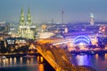 Aerial view of Cologne Cathedral and Hohenzollern Bridge at dusk Royalty Free Stock Photo