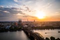 Aerial view of Cologne Cathedral and Hohenzollern Bridge at sunset, Germany Royalty Free Stock Photo