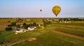 Aerial view of colorful balloons floating in the sky