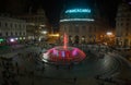 Aerial view of the colorful fountain of De Ferrari Square by night in Genoa, the heart of the city, Italy. Royalty Free Stock Photo