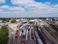 Aerial view of colorful freight trains on the railway station.