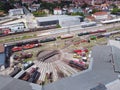 Aerial view of colorful freight trains on the railway station.