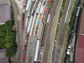 Aerial view of colorful freight trains on the railway station.