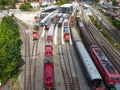 Aerial view of colorful freight trains on the railway station.