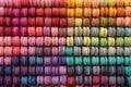 aerial view of colorful macarons arranged in rows