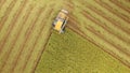 Aerial view of combine on harvest field