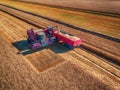 Aerial view of Combine harvester agriculture machine harvesting Royalty Free Stock Photo