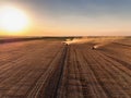 Aerial view of Combine harvester agriculture machine harvesting