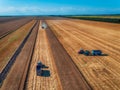 Aerial view of Combine harvester agriculture machine harvesting Royalty Free Stock Photo