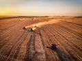 Aerial view of Combine harvester agriculture machine harvesting