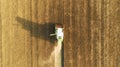 Combine harvester working on the large wheat field. Royalty Free Stock Photo