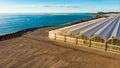 Aerial view. Commercial greenhouses on coast, Spain