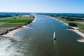 aerial view commercial ship crossing the River Rhine in an area