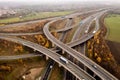 Aerial view of a complex motorway road layout in the UK countryside