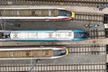 Aerial view above a fleet of high speed passenger trains Royalty Free Stock Photo