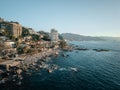 Aerial view of Conchas Chinas Beach and hotels in Puerto Vallarta Mexico in late afternoon