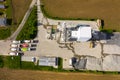 Aerial view of concrete and cement mortar plant. Concrete mixing silo for stone and sand. Bulk material storage site. Industrial Royalty Free Stock Photo