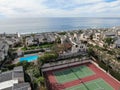 Aerial view of condo community with tennis court and pool in South California Royalty Free Stock Photo