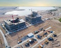 Aerial view of a Construction crane tower. Top view Crane and building working progress. Worker. Construction Site view by drone. Royalty Free Stock Photo