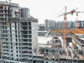 Aerial view for the construction of a residential building, tower crane. Autumn, St. Petersburg, Russia. Royalty Free Stock Photo