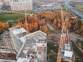 Aerial view for the construction of a  residential building, tower crane. Autumn, St. Petersburg, Russia Royalty Free Stock Photo