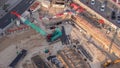 Aerial view construction site with a foundation pit of new skyscraper timelapse.