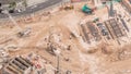 Aerial view construction site with a foundation pit of new skyscraper timelapse. Royalty Free Stock Photo