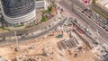 Aerial view construction site with a foundation pit of new skyscraper timelapse. Royalty Free Stock Photo