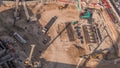 Aerial view construction site with a foundation pit of new skyscraper timelapse. Royalty Free Stock Photo