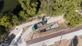 Aerial View of Construction Site with Machinery and Workers Royalty Free Stock Photo