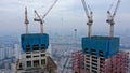 Aerial view of construction site. People working. Top view of new apartment under construction. Picture made by drone from above Royalty Free Stock Photo