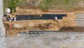 Aerial View of Construction Site with Pipes in Trenches Royalty Free Stock Photo