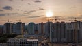 Aerial view of construction site of residential area buildings with cranes at sunset from above, urban skyline Royalty Free Stock Photo