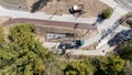 Aerial View of Construction Site with Trucks and Workers Royalty Free Stock Photo